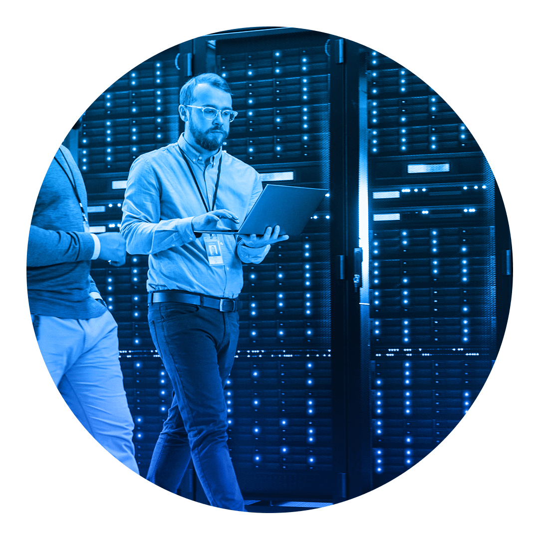 two people walking in data center